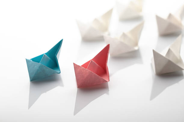 istock Origami paper ship on white background 605772954