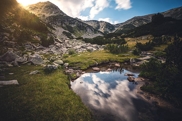 istock Sunset over beautiful mountain landscape 605774088