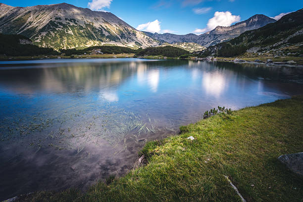 istock Beautiful lake in mountains 605774138