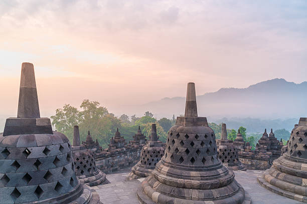 istock Borobudur Temple at sunrise. Yogyakarta 605774880