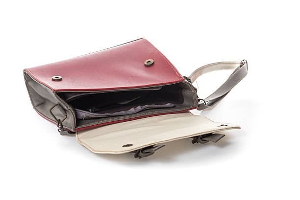 istock old woman bag on white background 605775484
