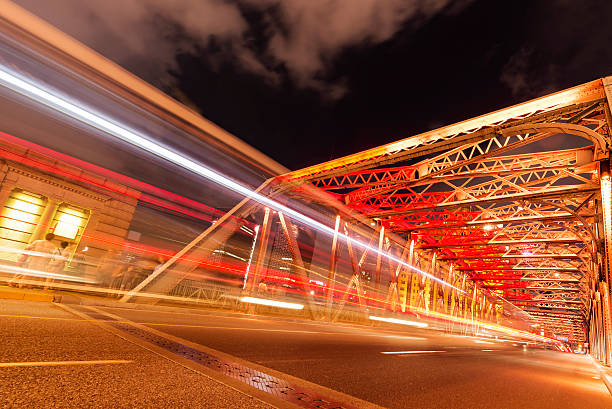 istock light trails on the modern building background in shanghai china 605776140