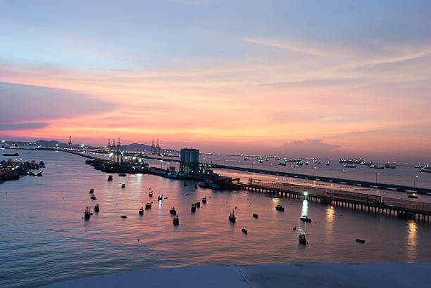 istock sunset at seaport more ship waiting 605778974