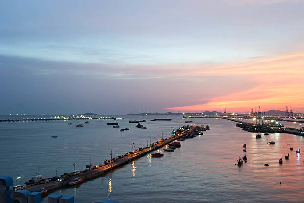 istock sunset at seaport more ship waiting 605779024