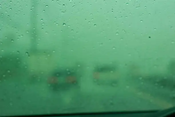 blur water drop on the car window in rainyday