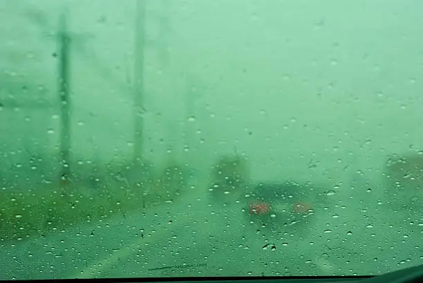 blur water drop on the car window in rainyday