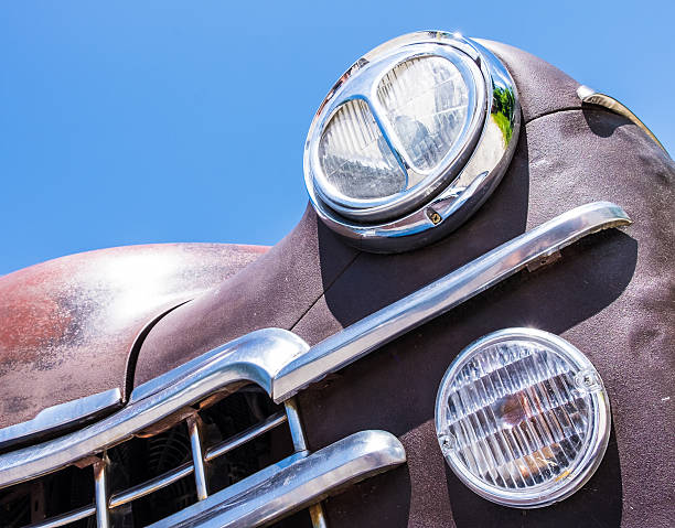 istock headlight of an oldtimer - vintage car 605784288