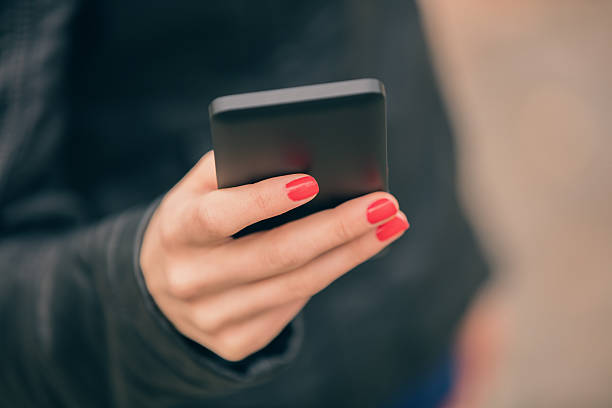 istock Urban girl using cellphone. 605784664