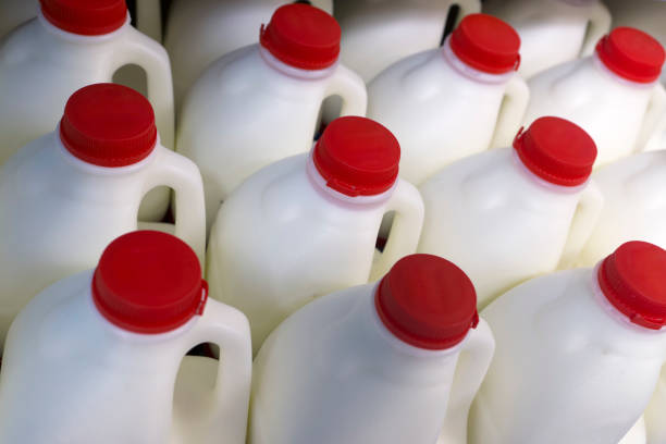 istock Milk  bottles in a supermarket 605784700