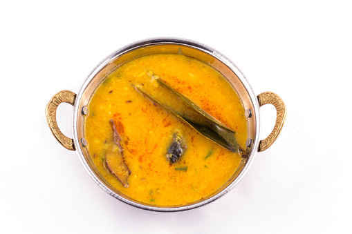 Dal tadka - north indian food with raw spices for extreme flavor - yellow dal fry