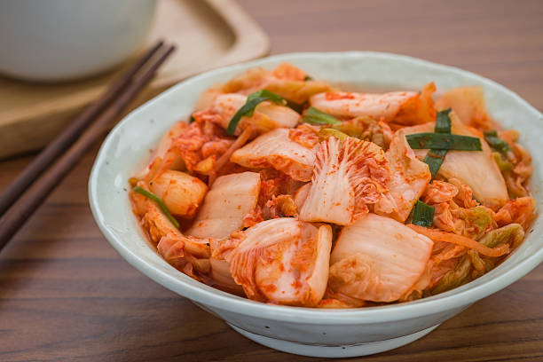 istock Kimchi in bowl, Korean food 605786908
