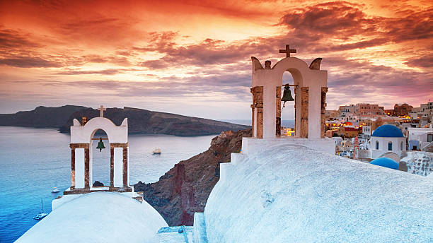 istock Sunset view to the sea from a belfry in Greece 605787512