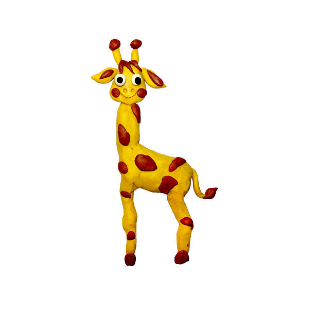 istock Plasticine  baby giraffe sculpture isolated on white 605788550