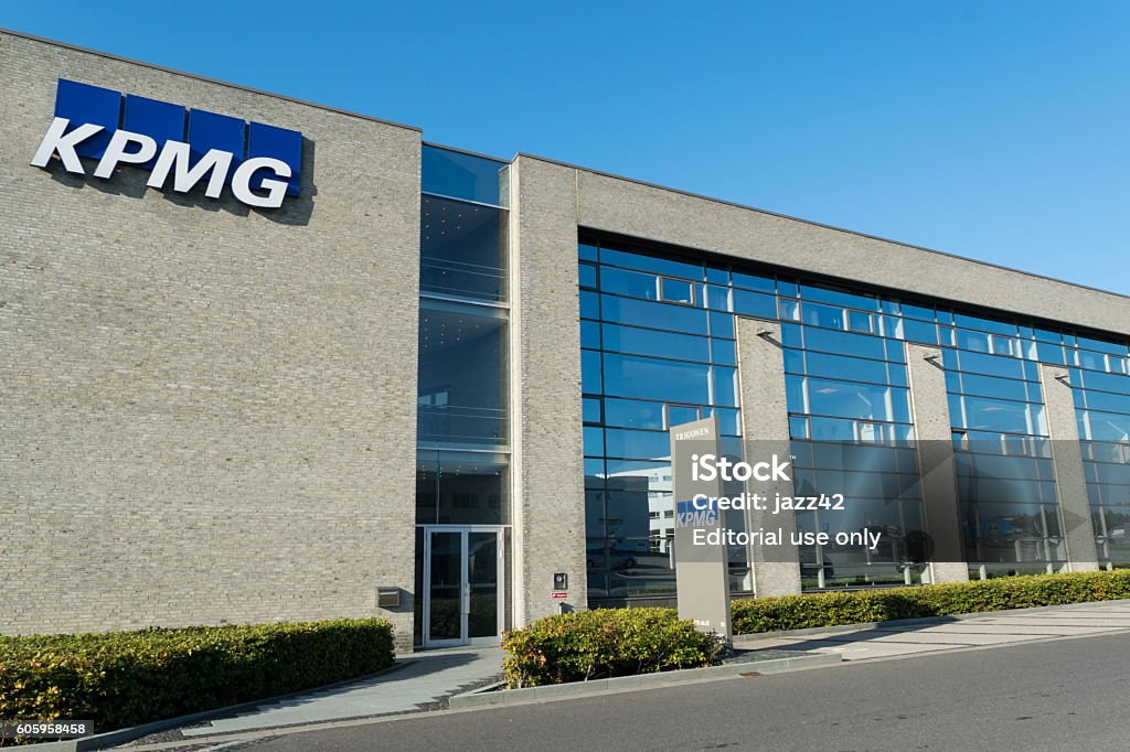 KPMG entrance with logo on building Aarhus, Denmark - September 14, 2016: KPMG entrance with logo on building Tax Stock Photo