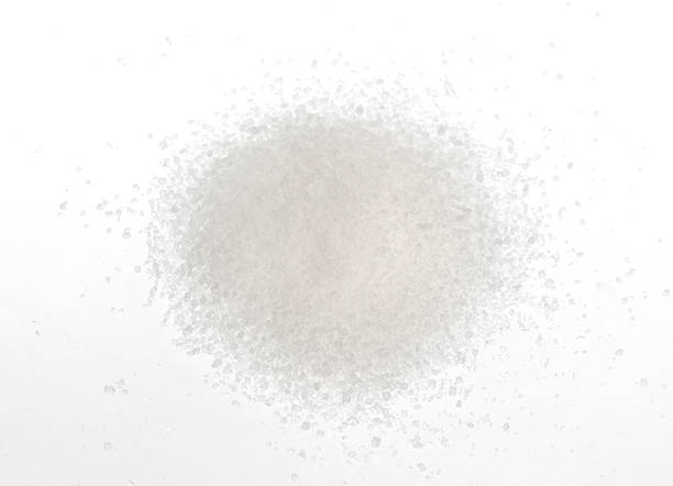 istock Pile of sugar isolated on white 605960502
