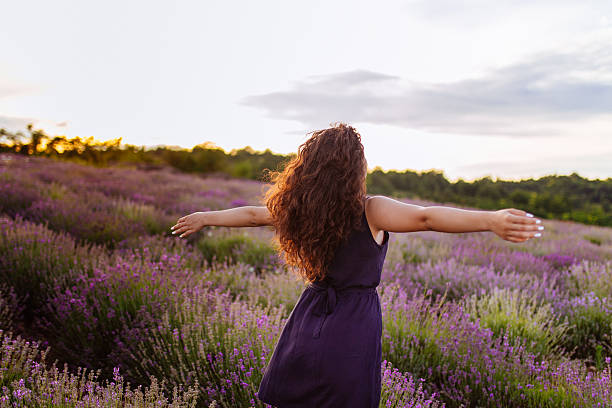 istock Arms out in lavender field 605968276