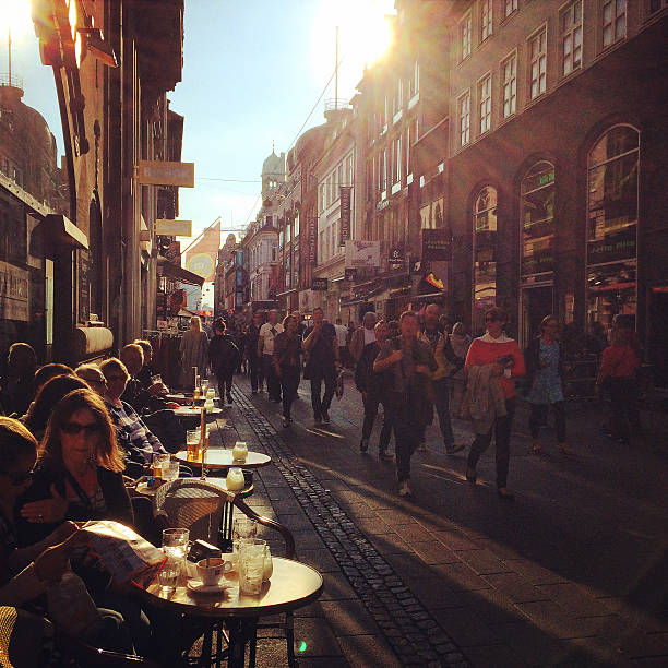 Copenhagen, Denmark  - September 12, 2014: People relaxing in a cafe, Copenhagen, Denmark
