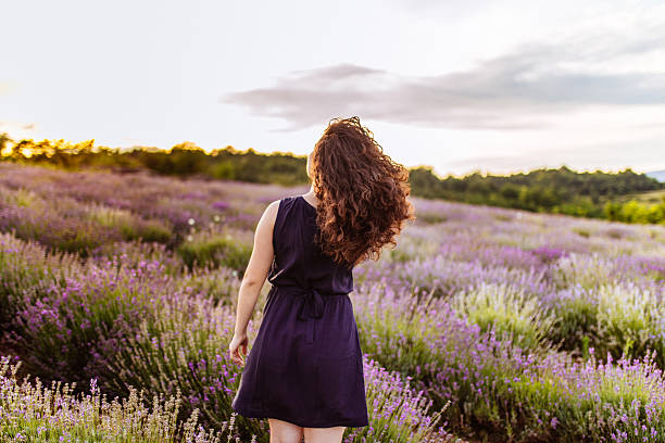 istock Enjoying sunset in lavender field 605973798