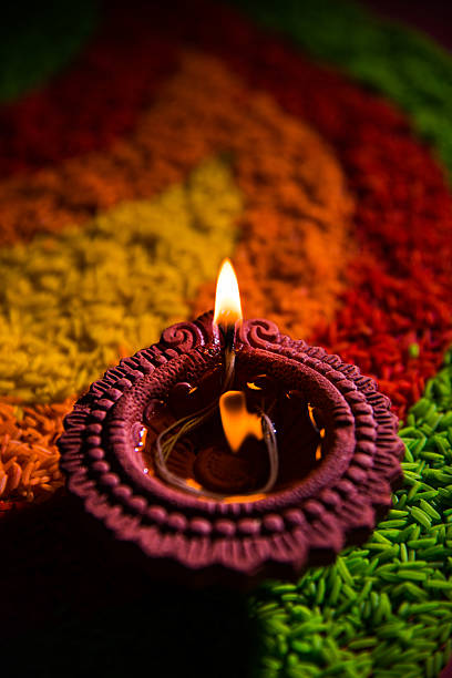 istock beautiful diwali lighting or diya, selective focus 605975028