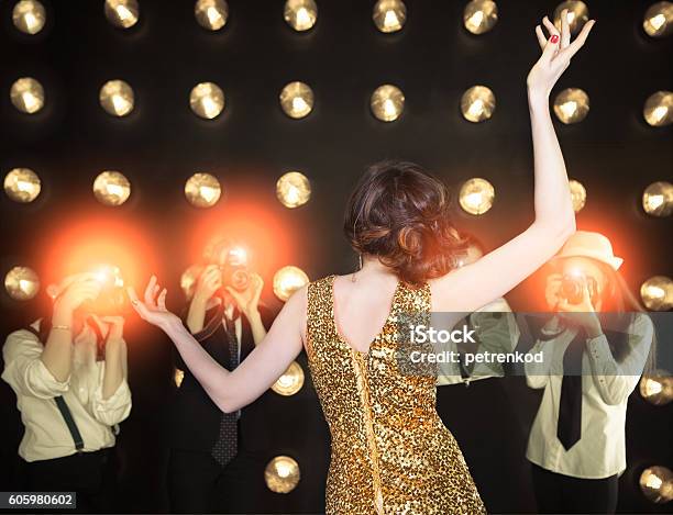 Superstar Woman Posing To Paparazzi Stock Photo - Download Image Now - Celebrities, Fame, Actress