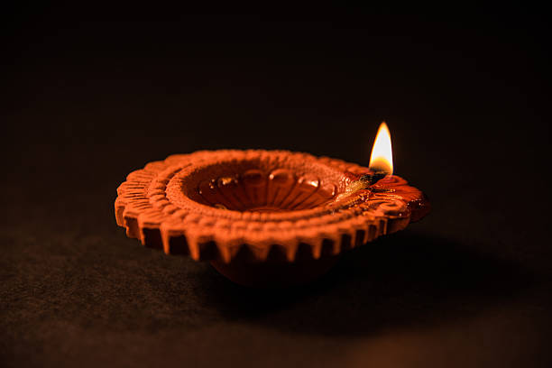 istock beautiful diwali lighting or diya, selective focus 605982450