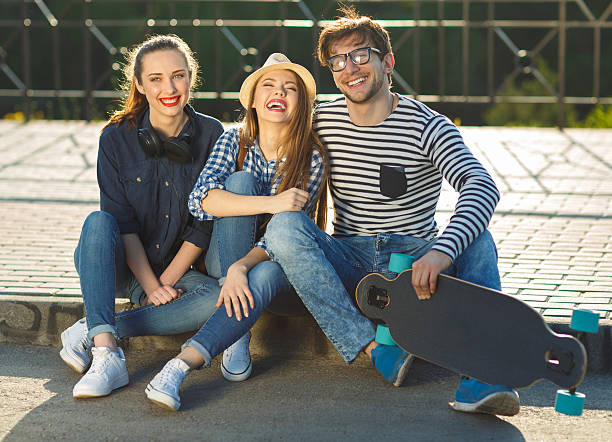 istock Smiling friends having fun outdoors 605983176