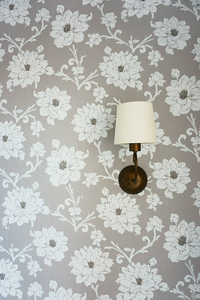 istock Lamp on the wall with wallpaper 605985288