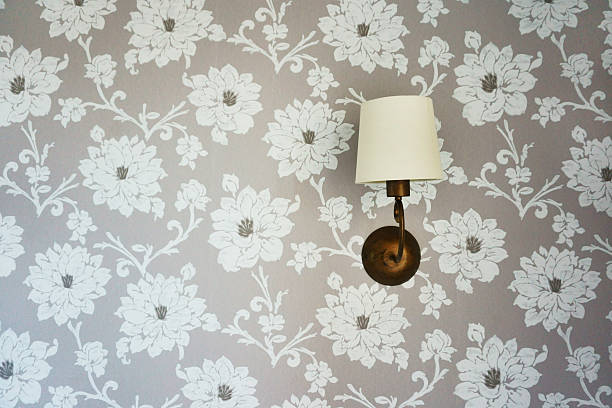 istock Lamp on the wall with wallpaper 605985378