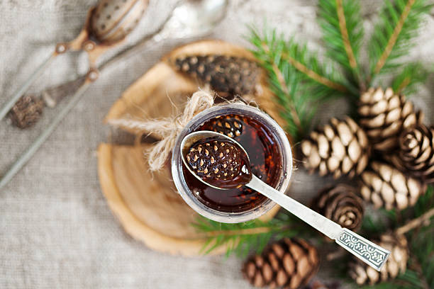 istock Traditional Siberian dessert confiture from young pine cones 605988134