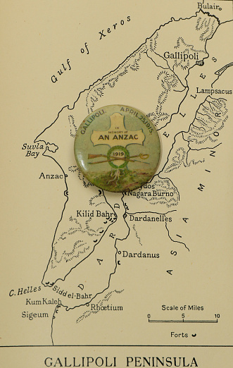 ANZAC memorial badge with map of Gallipoli campaign area.