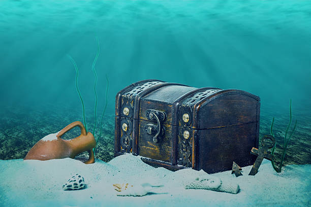 istock beautiful opened empty old wooden treasure chest submerged under 605990362