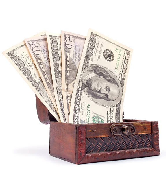 istock American Dollars in a wooden chest 605992968