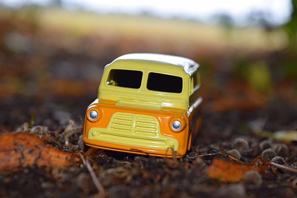 istock vintage toy car campervan outdoors landscape 605992990