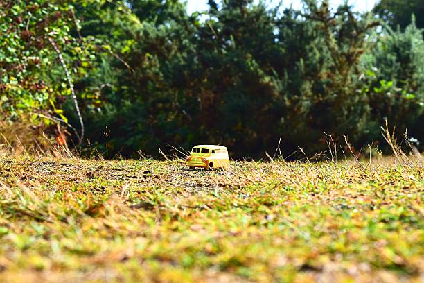 istock vintage toy car campervan outdoors landscape 605992994