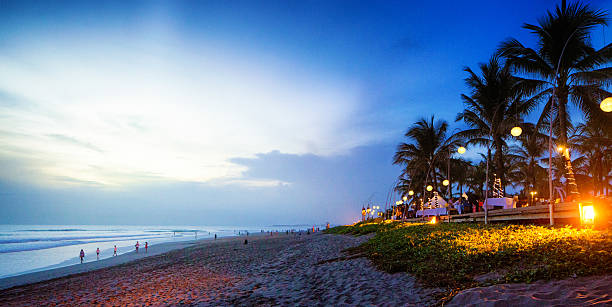 Seminyak Denpasar Bali Indonesia beach scene at sunset