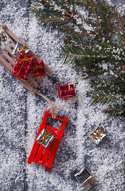 istock Christmas tree on wooden background 605995152