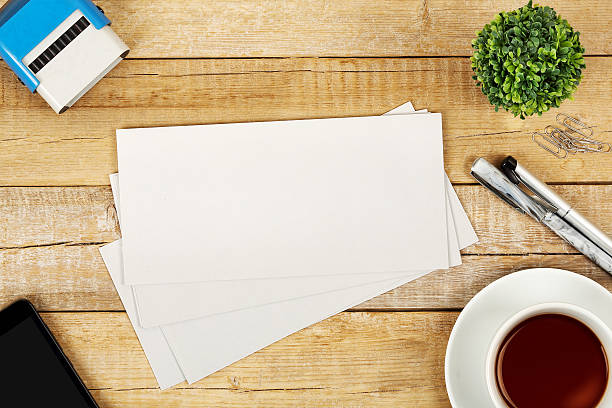 envelopes on desk stock photo