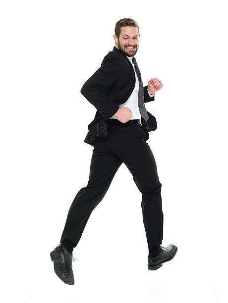 istock Cheerful businessman running 605999050