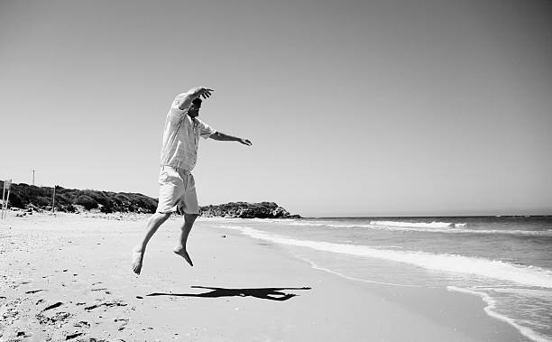 istock senior man on the beach 605999426