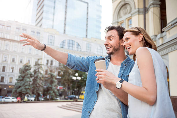 istock Positive young couple having a walk 606000532