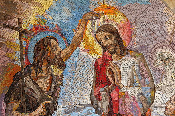Baptism of Jesus Christ by Saint John the Baptist Medjugorje, Bosnia and Herzegovina, August 16 2016: Mosaic of the baptism of Jesus Christ by Saint John the Baptist as the first Luminous mystery baptism stock pictures, royalty-free photos & images