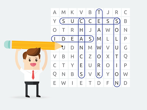 businessman playing word search puzzle and found teamwork, ideas, solution, chances and success