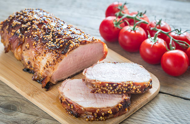istock Baked pork meat wrapped in bacon 606005578