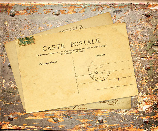 istock Retro post cards on ancient wooden plank 606006396