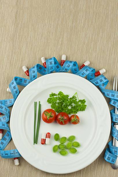 istock Strict diet against obesity. Dietary vegetable diet. 606007340