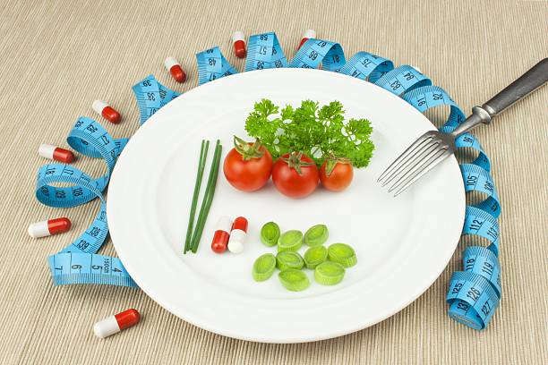 istock Strict diet against obesity. Dietary vegetable diet. 606007410