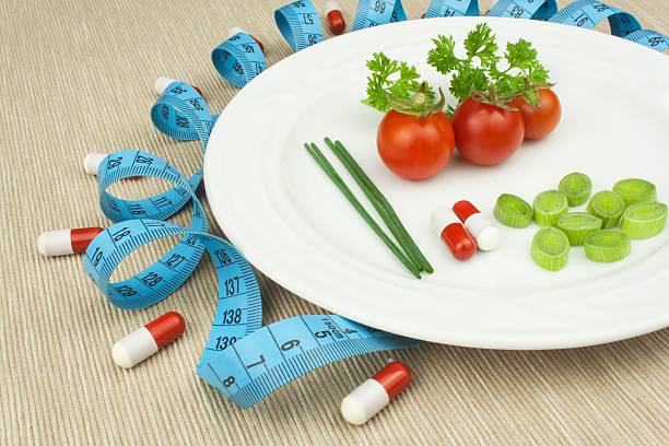istock Strict diet against obesity. Dietary vegetable diet. 606007442