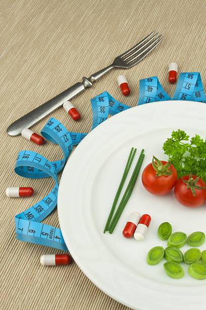 istock Strict diet against obesity. Dietary vegetable diet. 606007490
