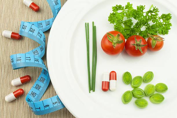istock Strict diet against obesity. Dietary vegetable diet. 606007524