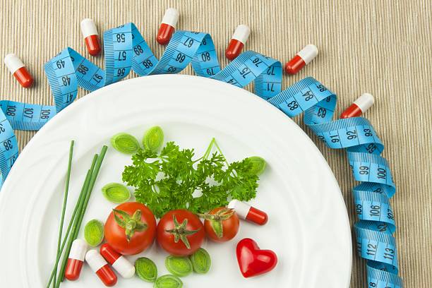 istock Strict diet against obesity. Dietary vegetable diet. 606007666
